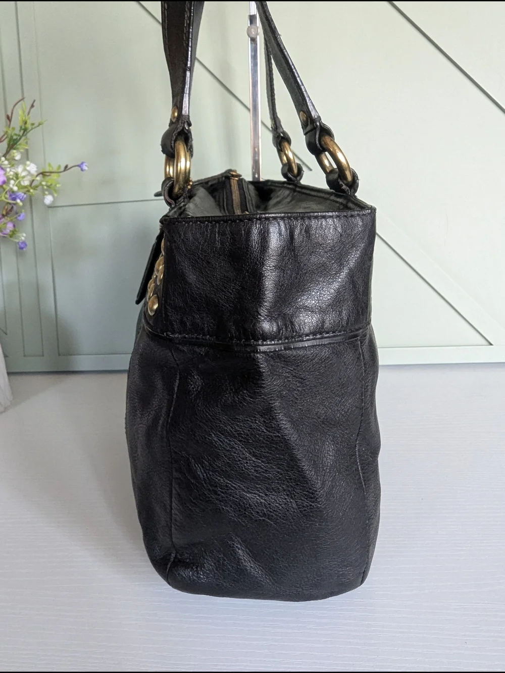 Coach Black Leather Shoulder Bag with Gold Stud Accents